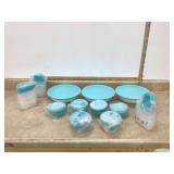 Various light blue Tupperware containers