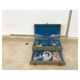 Vintage jewelry box filled with costume jewelry