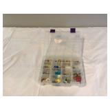 Multiple earrings in container