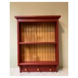 Red wood shelf with hooks