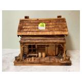 Wooden log cabin model with detachable roof