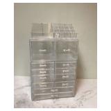 Clear acrylic storage bins that can be stacked on top of each other to maximize