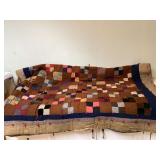 Hand-stitched patchwork quilt handmade colorful intricate