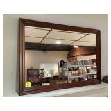 Large wood-framed mirror