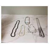 Various fake jewelry items