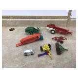 Vintage toys including manure spreader and car hauler