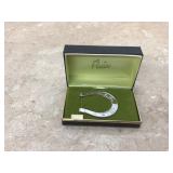 Vintage inspired horseshoe money clip with rhodium finish in a mid-century