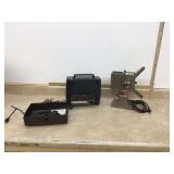 1 Two vintage movie projectors running