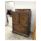 Antique Berkey & Gay 12-drawer dresser with minor damage for