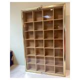 Display case with 28 compartments