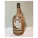 Vintage 15 Bacardi bottle in wicker labeled