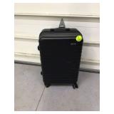 Amazon Basics hard shell rolling suitcase - durable high-quality luggage perfect for