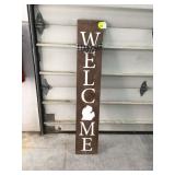 Large wooden sign with WELCOME text for porch