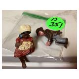 Antique cast iron coachmen and resin little girl figurines