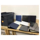 Multiple binders in a bin with lid Multiple binders in a bin with lid