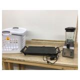 Appliances in laundry basket Appliances in laundry basket