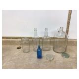 Collection of bottles with flower frog insert Collection of bottles with flower frog insert