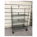 Mobile metal storage unit with 3 shelves Mobile metal storage unit with 3 shelves