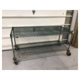 Metal storage unit with 2 shelves and wheels Metal storage unit with 2 shelves and wheels