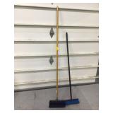 Two long-handled scrub brushes Two long-handled scrub brushes