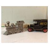 Antique metal train and armored truck banks