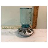 Jar feeder for chickens with blue ball