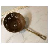 Antique copper colander with brass handle