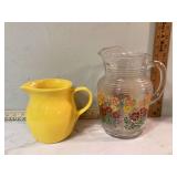 Antique water pitchers