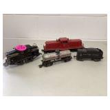 Vintage train set with Lionel switcher coal car tank car and