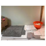 Rubber rug and basket with soap bars