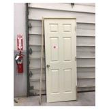 Door with frame inside a room