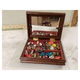 Assorted clip-on earrings in box