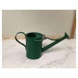 Tiny metal watering can