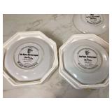 Two John Wayne collector plates with original boxes