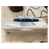 Compact vacuum sealer for food storage