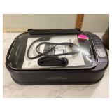 Smokeless indoor grill for cooking meat and vegetables