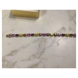 Colorful stones on silver bracelet