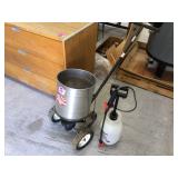 Spreader with hand sprayer