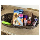 DOG GROOMING SUPPLIES IN BASKET