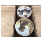 Collectible plates featuring dogs