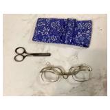 Glasses with lenses that flip and scissors