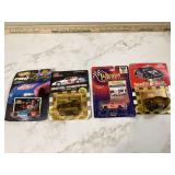 4 STOCK CARS WITH COLLECTOR CARDS
