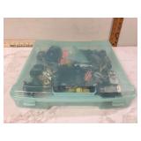 Collection of vintage toy cars in a plastic tote
