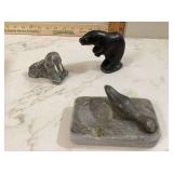 Three Inuit-carved figurines signed depicting walrus seal