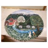 Large circular saw blade painted 28 across