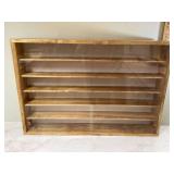 Cabinet attached to wall for displaying items