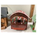 Four birdhouses three bird figurines