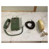 Vintage wall phone and yellow Conairphone