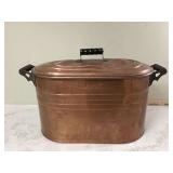 Old copper boiler with lid