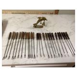 Antique brass doorbell striker and fondue forks